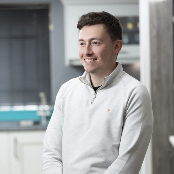 Ashington Showroom Kitchen Design and Bespoke Furniture Consultant, Ben in a white shirt