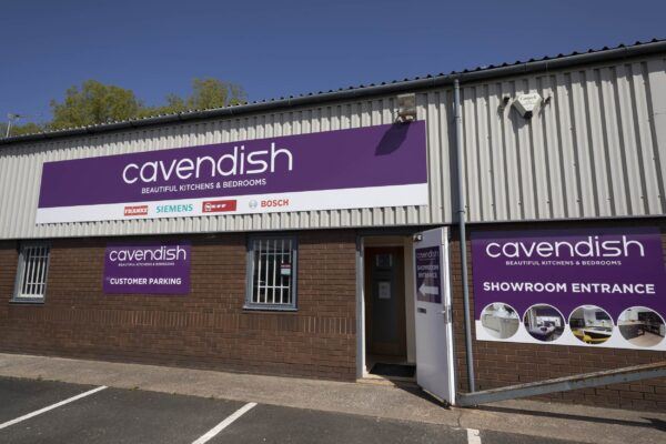 Exterior of the Cavendish Ashington Showroom Entrance with Signs
