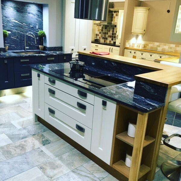 Cavendish Kitchen Showroom Island with Storage Underneath, Integrated Double Hob, White Cabinet Drawers, Elevated Wood Surface around Island