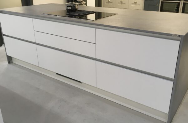 Large Modern island in white with grey metallic finish worktop and handless cabinetry