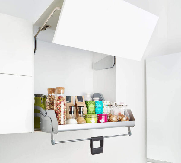 A Cavendish designed Kitchen. White open pull down shelving larder hidden behind white cabinet pull up.